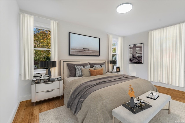 bedroom featuring light hardwood / wood-style floors