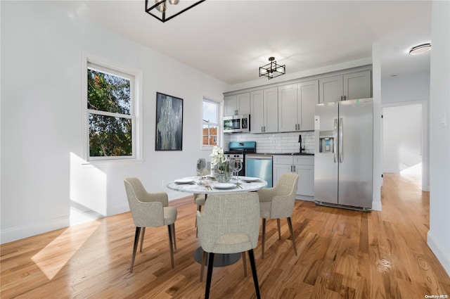 dining room featuring light hardwood / wood-style floors