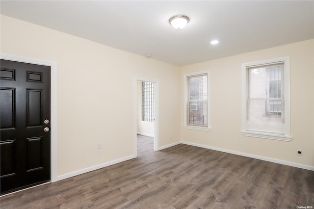 foyer entrance with dark wood-type flooring