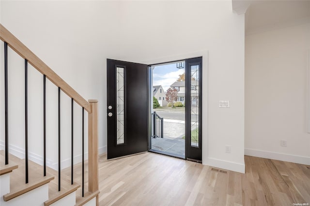 entrance foyer featuring light hardwood / wood-style floors