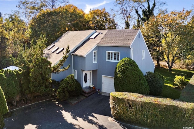 view of front of home with a garage