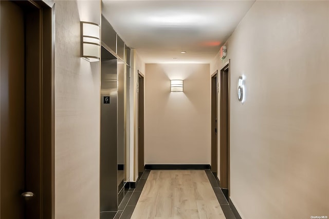 hall featuring hardwood / wood-style flooring