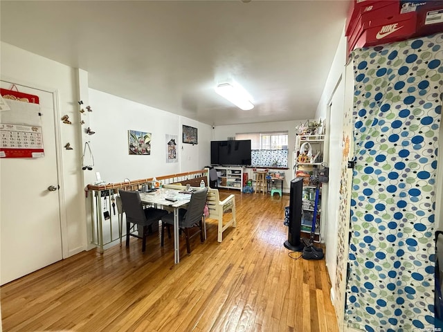 dining room featuring light hardwood / wood-style flooring