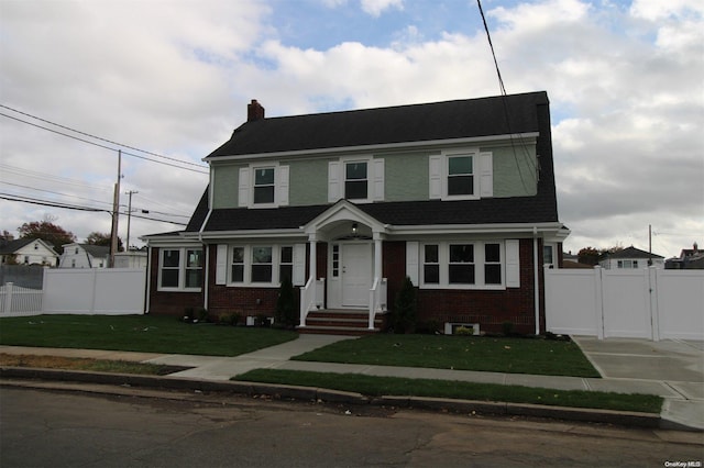 view of front facade featuring a front lawn