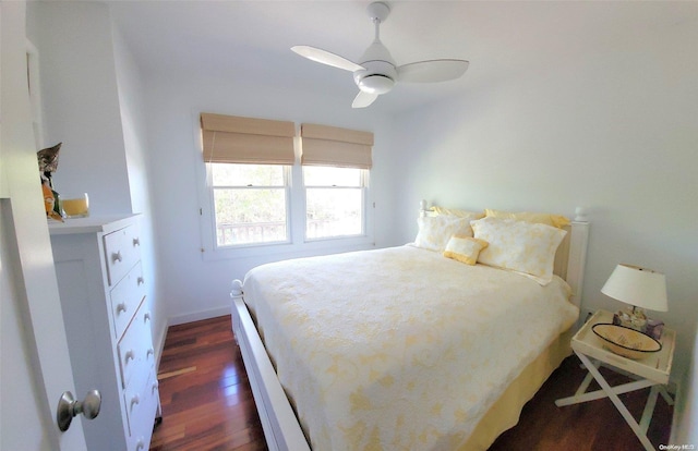 bedroom featuring ceiling fan and dark hardwood / wood-style flooring