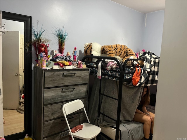 bedroom featuring hardwood / wood-style floors