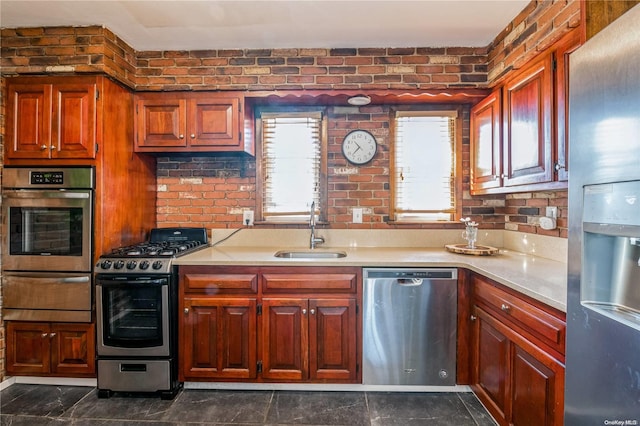 kitchen with appliances with stainless steel finishes and sink