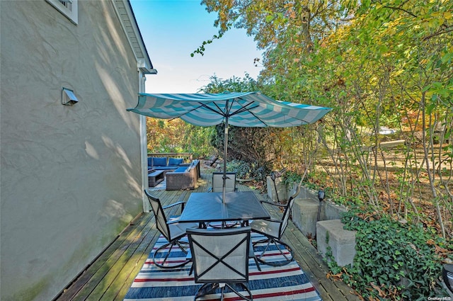 view of patio with an outdoor hangout area and a deck