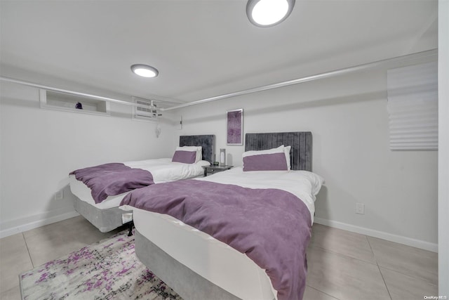 bedroom featuring light tile patterned flooring