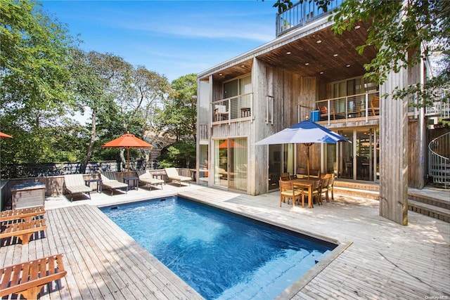 view of pool featuring a patio area