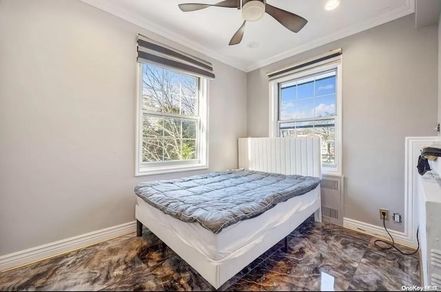 bedroom featuring multiple windows, ceiling fan, radiator heating unit, and ornamental molding