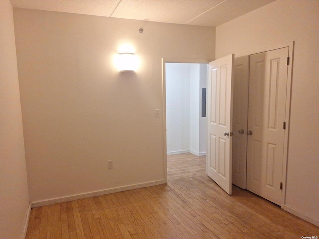 spare room featuring light hardwood / wood-style flooring