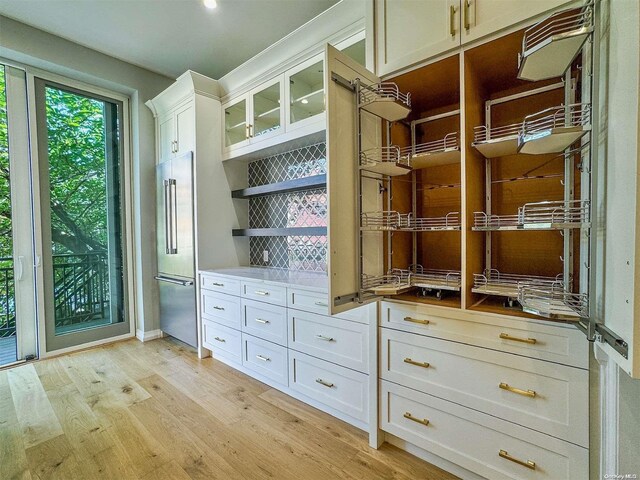 walk in closet featuring light wood-type flooring