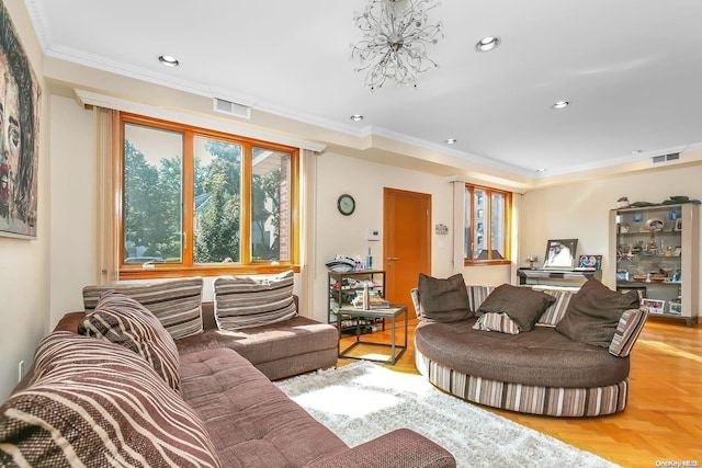 living room with a chandelier, ornamental molding, and light parquet flooring