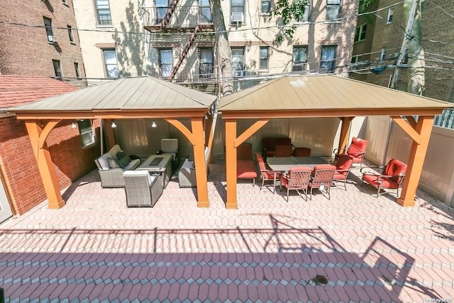 view of patio / terrace with a gazebo and outdoor lounge area