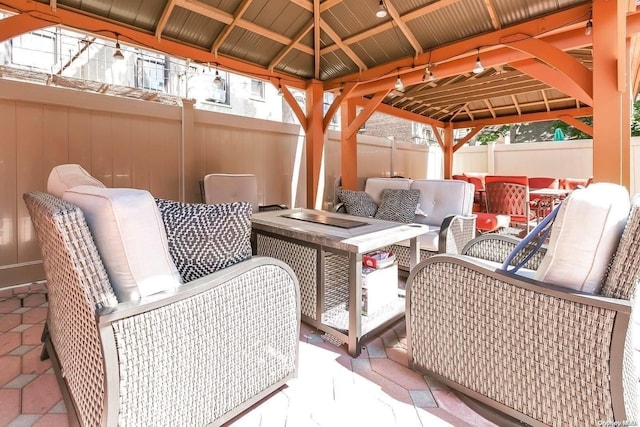 view of patio featuring a gazebo and an outdoor living space