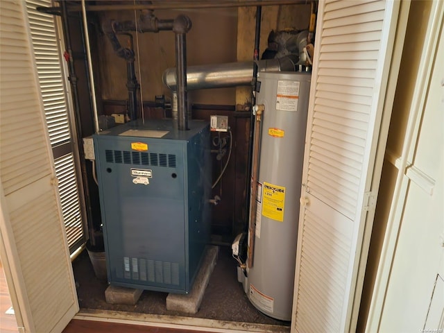 utility room with gas water heater