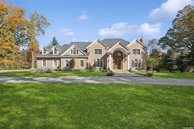 view of front of house with a front lawn