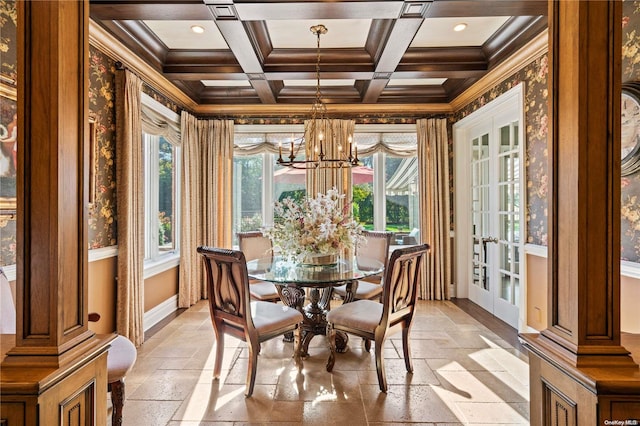 sunroom featuring a chandelier, beam ceiling, decorative columns, and coffered ceiling