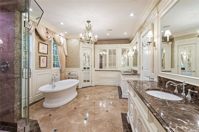 bathroom featuring vanity, plus walk in shower, a chandelier, and ornamental molding