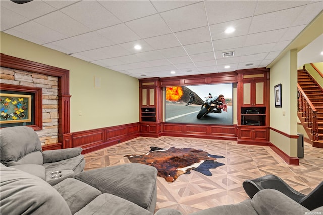 home theater room featuring light parquet flooring