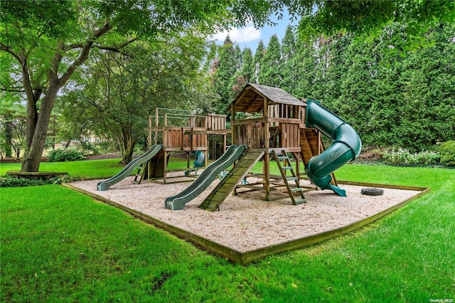 view of playground with a lawn