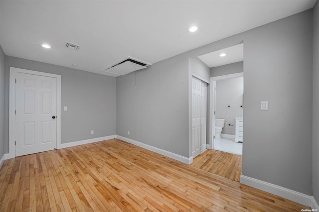 unfurnished room with light hardwood / wood-style floors