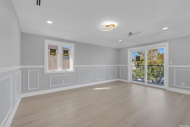 empty room with light wood-type flooring