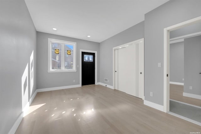 foyer entrance featuring light hardwood / wood-style flooring