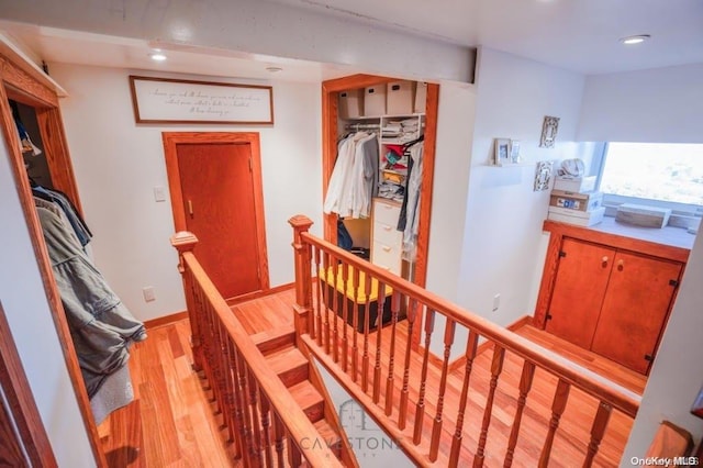 337 Howard Ave, Staten Island, NY 10301 - hallway featuring light wood-type flooring, recessed lighting, an upstairs landing, and baseboards