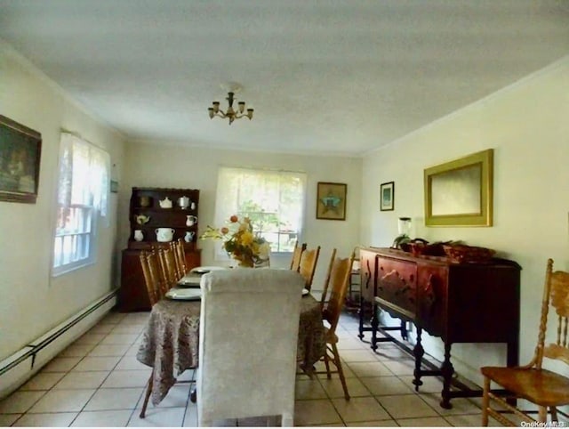 dining space with a chandelier, crown molding, light tile patterned floors, and a baseboard radiator