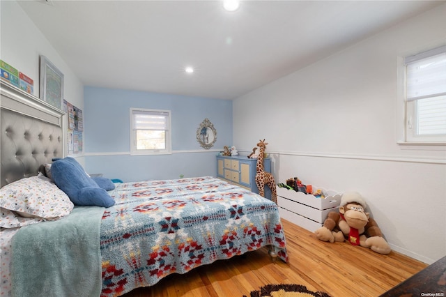 bedroom with wood-type flooring