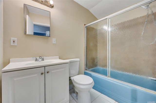 full bathroom featuring vanity, lofted ceiling, tile patterned flooring, toilet, and enclosed tub / shower combo