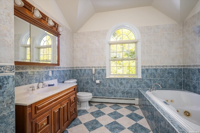 bathroom featuring vanity, lofted ceiling, a relaxing tiled tub, baseboard heating, and tile walls