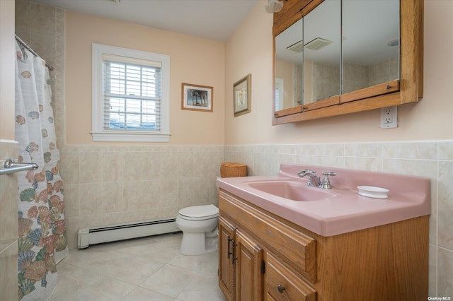 bathroom with vanity, a baseboard radiator, tile walls, tile patterned flooring, and toilet