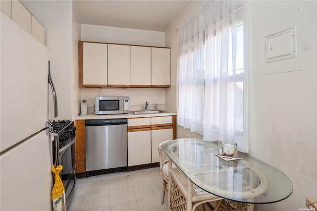 kitchen with sink and stainless steel appliances