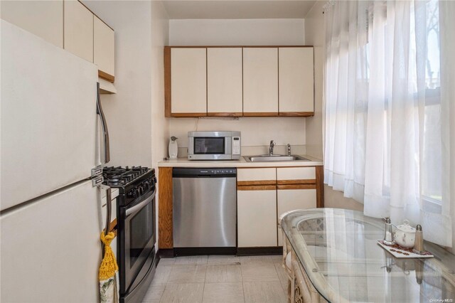 kitchen featuring sink and appliances with stainless steel finishes