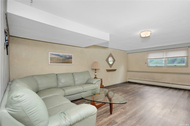 living room featuring wood-type flooring and a baseboard radiator