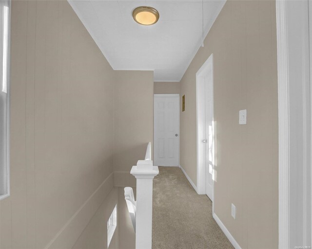 94-51 226th St, Floral Park, NY 11001 - hall with an upstairs landing, light colored carpet, and baseboards
