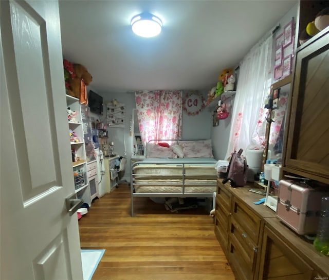 bedroom featuring light hardwood / wood-style flooring