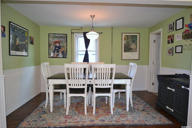 dining space featuring dark hardwood / wood-style floors