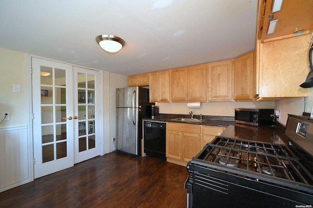 kitchen featuring french doors, sink, black appliances, light brown cabinets, and dark hardwood / wood-style floors