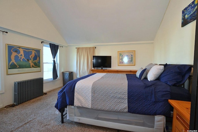 carpeted bedroom with radiator and vaulted ceiling