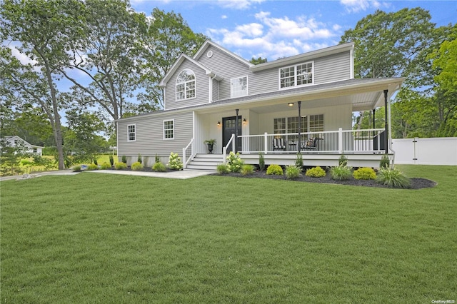 view of front facade featuring a porch and a front lawn