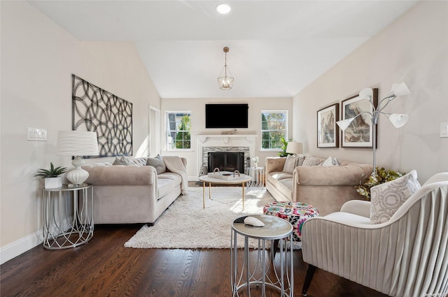 living room featuring lofted ceiling and dark wood-type flooring