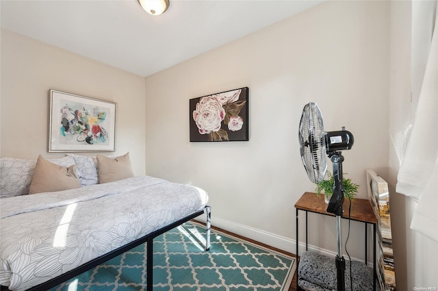 bedroom with hardwood / wood-style flooring