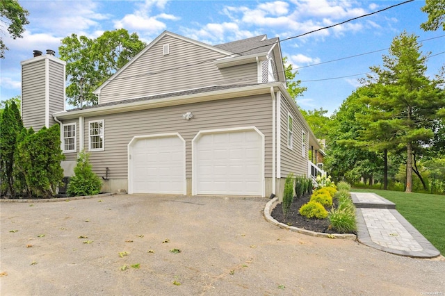 view of home's exterior featuring a garage