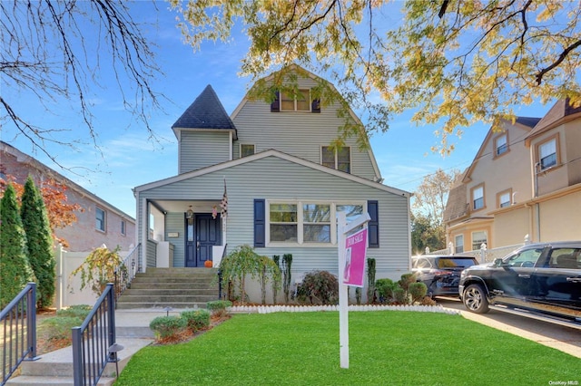 view of front of property with a front yard