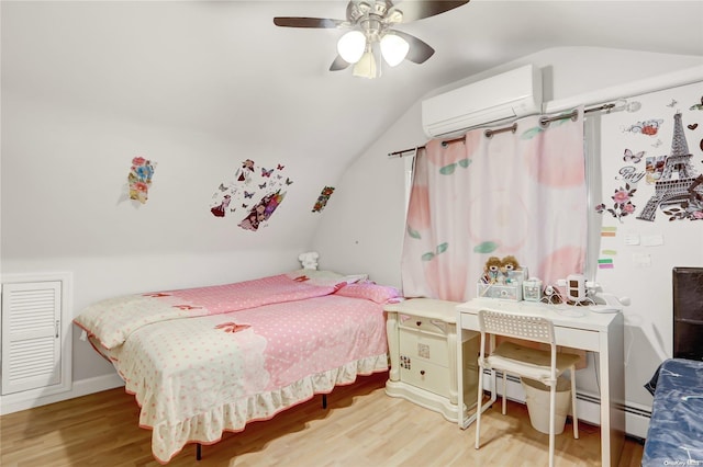 bedroom with ceiling fan, a wall mounted air conditioner, baseboard heating, wood-type flooring, and vaulted ceiling