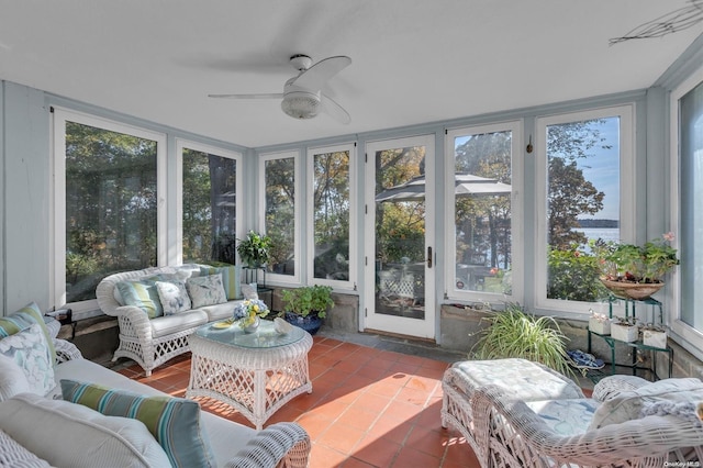 sunroom / solarium with ceiling fan